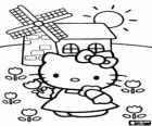 Hello Kitty nimmt mohn während einem spaziergang vorbei an einer windmühle auf dem gebiet