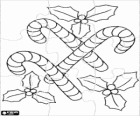 Weihnachtsschmuck puzzle. Puzzle von Zuckerstangen mit ein paar Zweige der Stechpalme