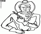 Ein Cowboy mit dem Revolver in der hand