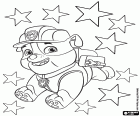 Die Paw Patrol Welpen freut sich Rubble zwischen den Sternen, die die Weihnachtsfeiern dekorieren